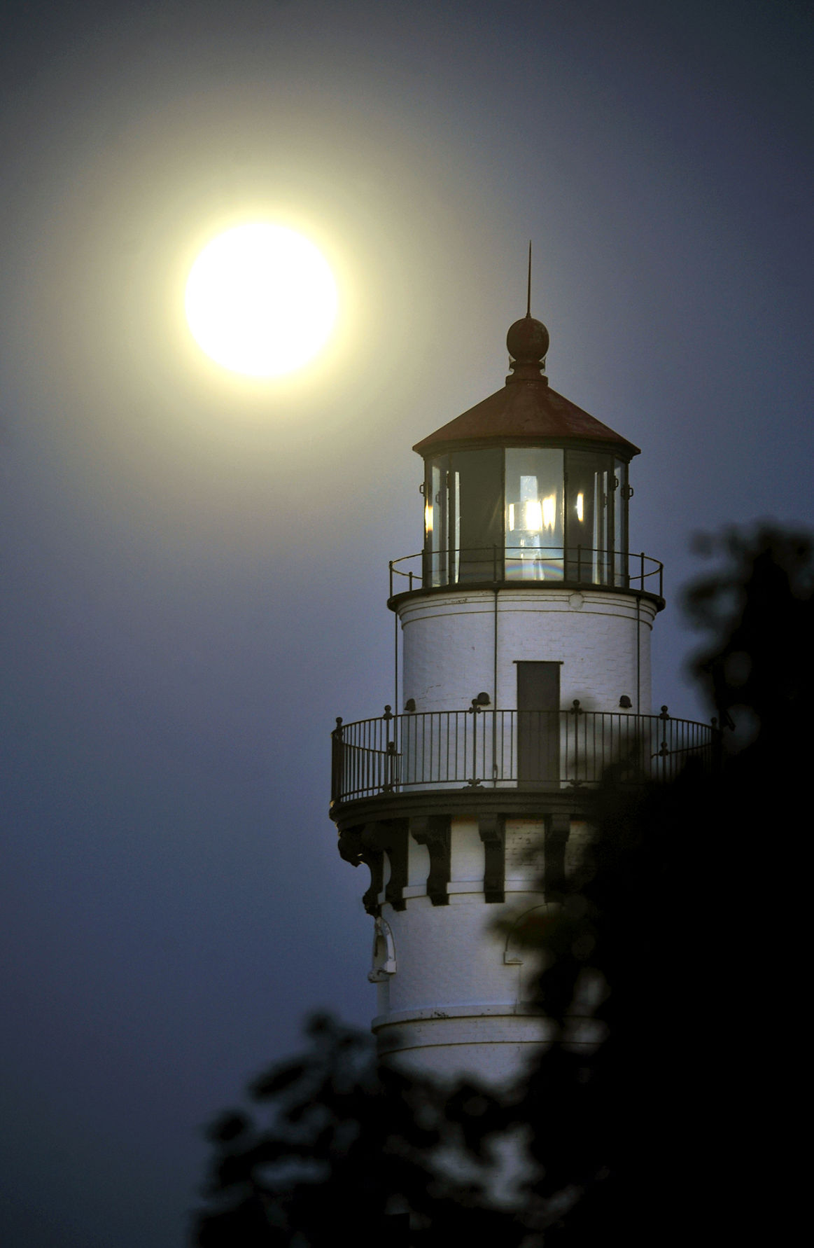 Full moon over lighthouse
